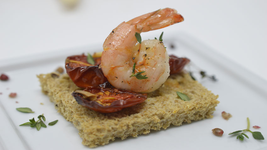 Roasted tomatoes and shrimps bruschetta